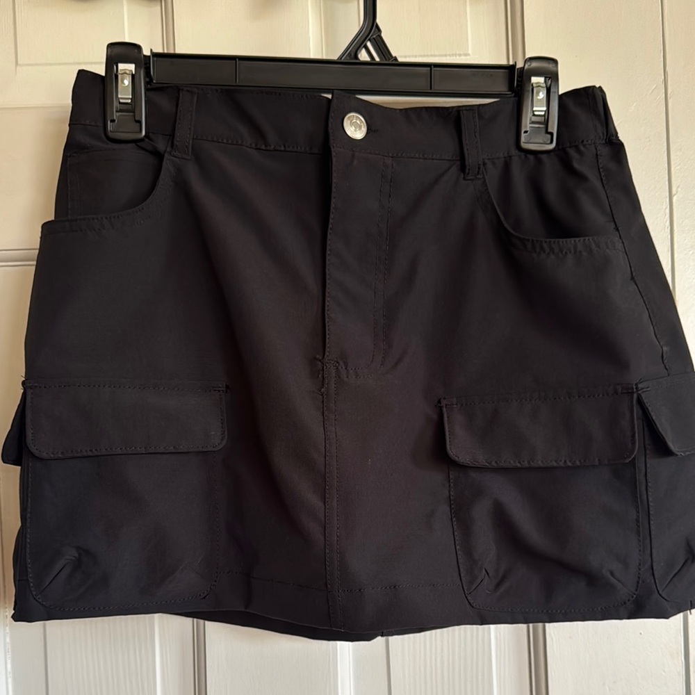 Priceless Boutique black Cargo Mini Skirt with pockets.
